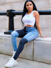 Vaqueros de talle alto con diseño patchwork y bloques de color